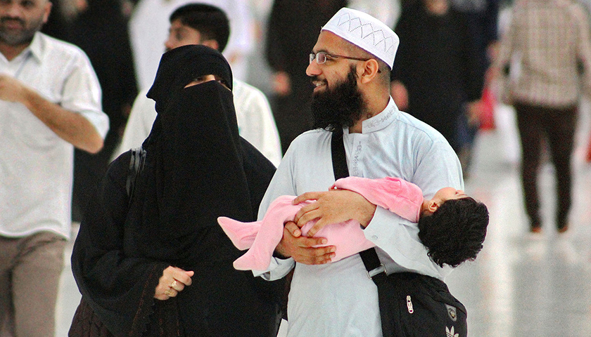 Young Muslim Couple with Toddler at Masjid al-Haram