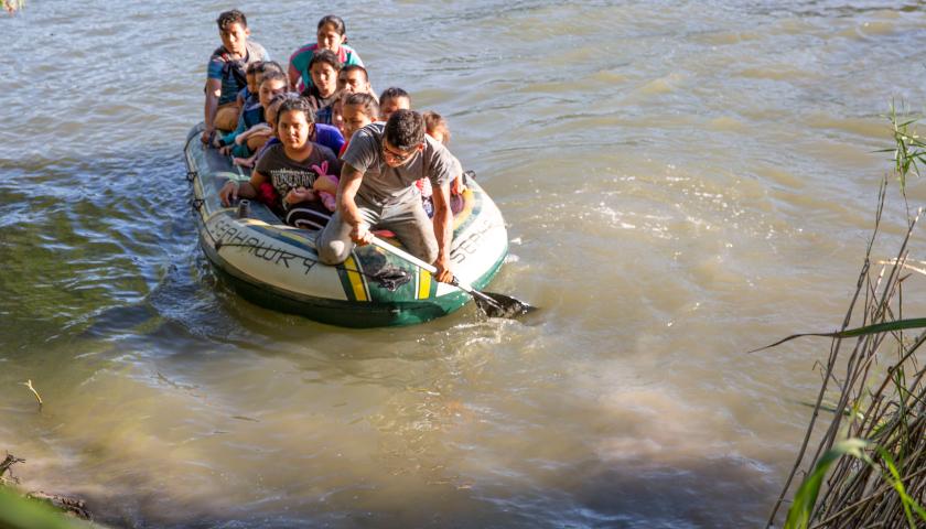 Illegal migrants crossing Rio Grande
