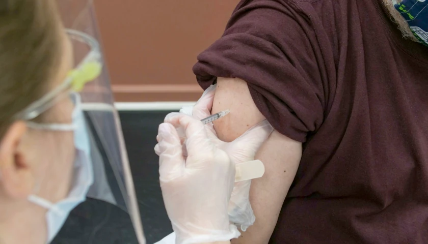 Man receiving vaccine